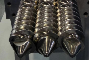 What is the Function of the Screw Barrel during the Extrusion Process